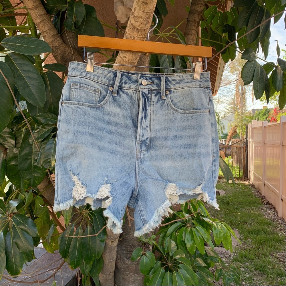 Good American distressed high waisted denim shorts!